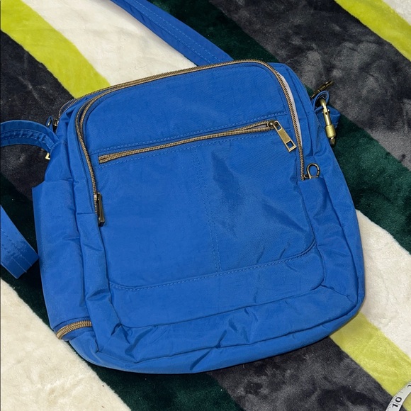 Travelon Royal Blue Crossbody Messenger Bag with Gold Hardware - Picture 13 of 13